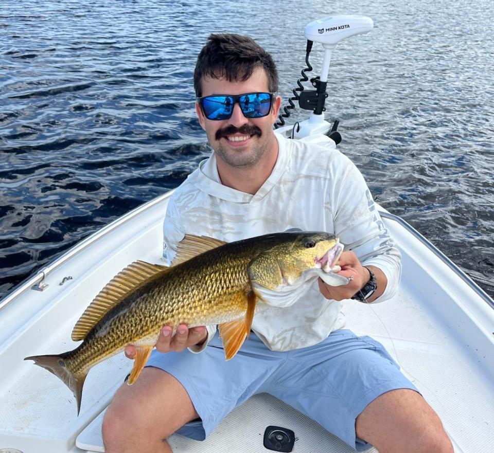 Drew Peden, of Deltona, caught this 28-inch redfish while fishing with Cam Jergens in Spruce Creek.