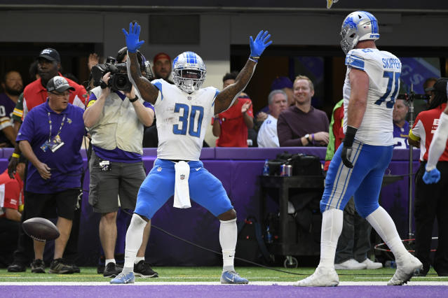 DETROIT, MI - SEPTEMBER 26: Detroit Lions running back Jamaal Williams (30)  celebrates after a fourth quarter touchdown during NFL game between  Baltimore Ravens and Detroit Lions on September 26, 2021 at