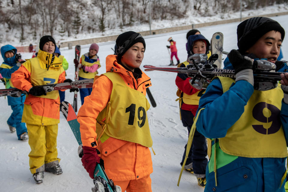 North Korean boys finish up a ski lesson at Masikryong Ski Resort on Feb. 4, near Wonsan, North Korea.