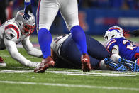 New England Patriots defensive end Lawrence Guy (93) falls on a ball fumbled by Buffalo Bills running back Matt Breida (22) during the first half of an NFL football game in Orchard Park, N.Y., Monday, Dec. 6, 2021. (AP Photo/Adrian Kraus)