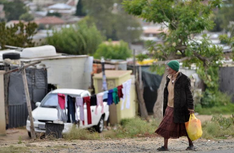 A woman in the impoverished Diepsloot township outside Johannesburg, South Africa, on April 16, 2014