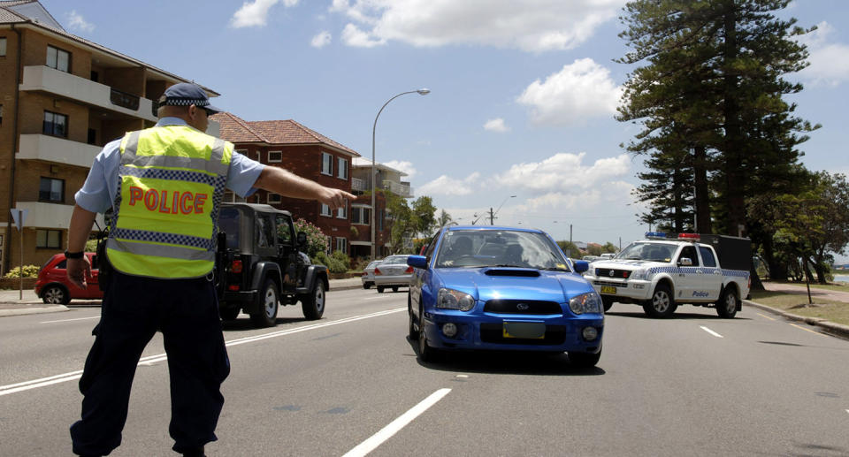 NSW Police officer pulls over a car. Source: AAP