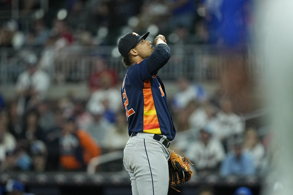 Houston Astros relief pitcher Bryan Abreu (52) celebrates in the ninth inning of a baseball game against the Atlanta Braves, Saturday, April 22, 2023, in Atlanta. (AP Photo/Brynn Anderson)