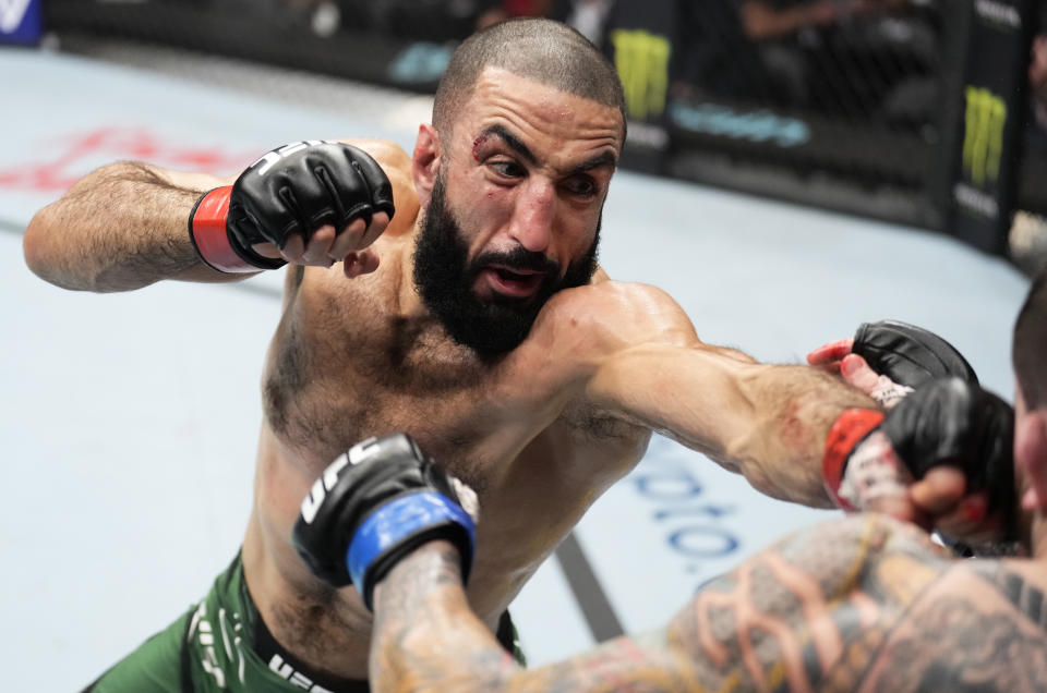 ABU DHABI, UNITED ARAB EMIRATES - OCTOBER 22: (L-R) Belal Muhammad punches Sean Brady in a welterweight fight during the UFC 280 event at Etihad Arena on October 22, 2022 in Abu Dhabi, United Arab Emirates. (Photo by Chris Unger/Zuffa LLC)