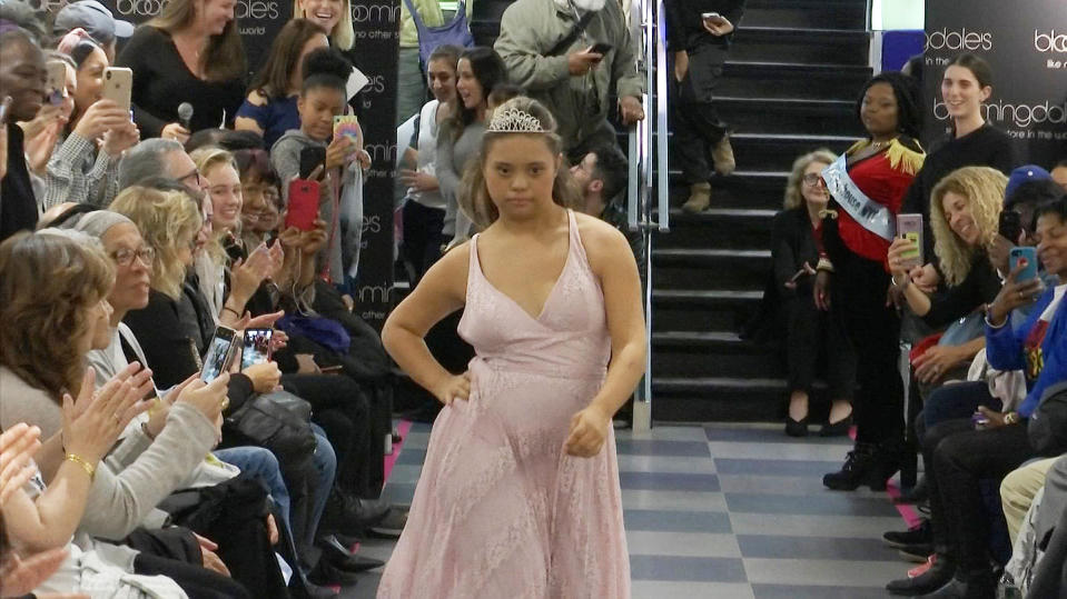 This image from video taken on Wednesday, Oct. 16, 2019 shows Laura Lyle participating in the 2nd annual “Gigi’s Playhouse Fashion Show” in New York. Gigi’s Playhouse is an education and achievement center that prepares young people with Down syndrome to engage more fully in their homes, schools and communities. (AP Photo/Gary Gerard Hamilton)