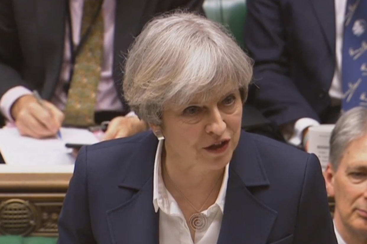 Theresa May signals the beginning of Brexit in Parliament yesterday: PA