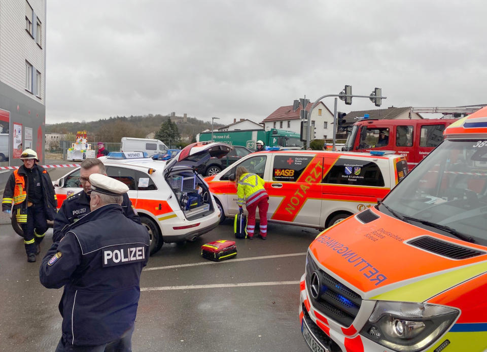 Fire brigades work close to the site where a car drove into a carnival procession in Volkmarsen near Kassel, central Germany, on Rose Monday, February 24, 2020. - Several people were injured when a car drove into a carnival procession in Volksmarsen, police said, adding that the driver had been arrested. (Photo by Elmar SCHULTEN / AFP) (Photo by ELMAR SCHULTEN/AFP via Getty Images)