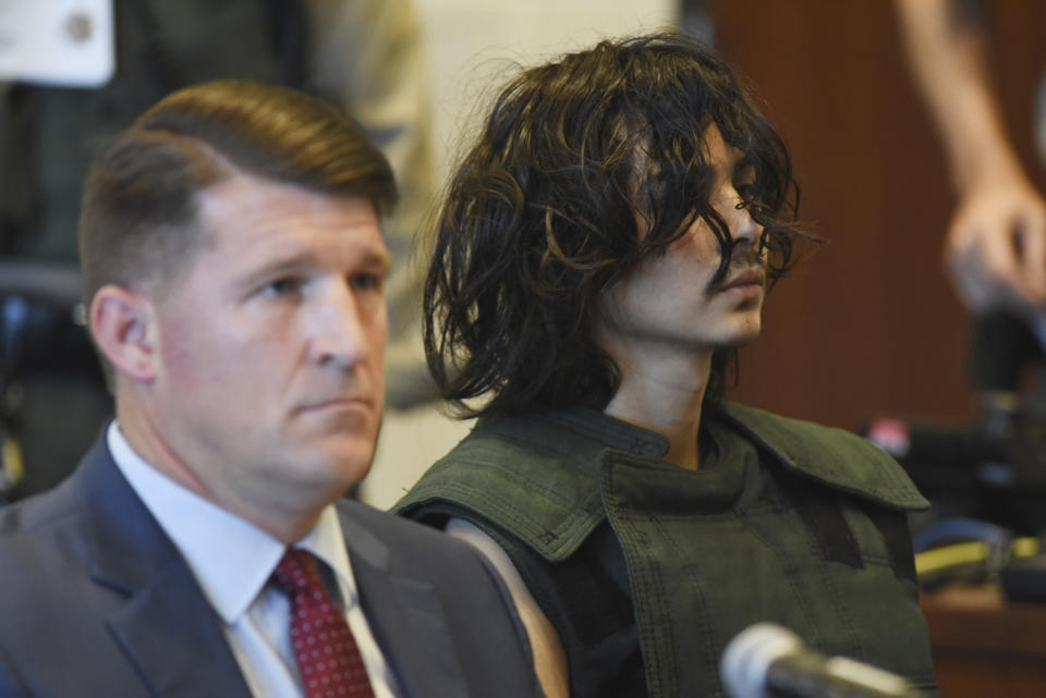 Carlos Dominguez, right, appears at a pre-conference hearing at Yolo County Superior Court in Woodland, Calif., Monday, May 22, 2023, with Dan Hutchinson, deputy public defender. A judge on Monday ordered a psychiatric review of the former University of California, Davis student charged in the deaths of two stabbing victims and attempted murder of a third person as part of a series of attacks that alarmed the usually serene community. An attorney for Dominguez said in court that his client is not mentally competent to stand trial. (Fred Gladdis/The Davis Enterprise via AP, Pool)