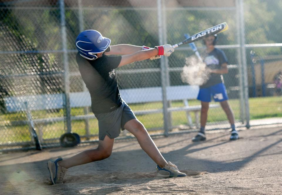 Eli Hart bats during Little League practice on Monday, August 1, 2022, at Cherry Rock Park in Sioux Falls.