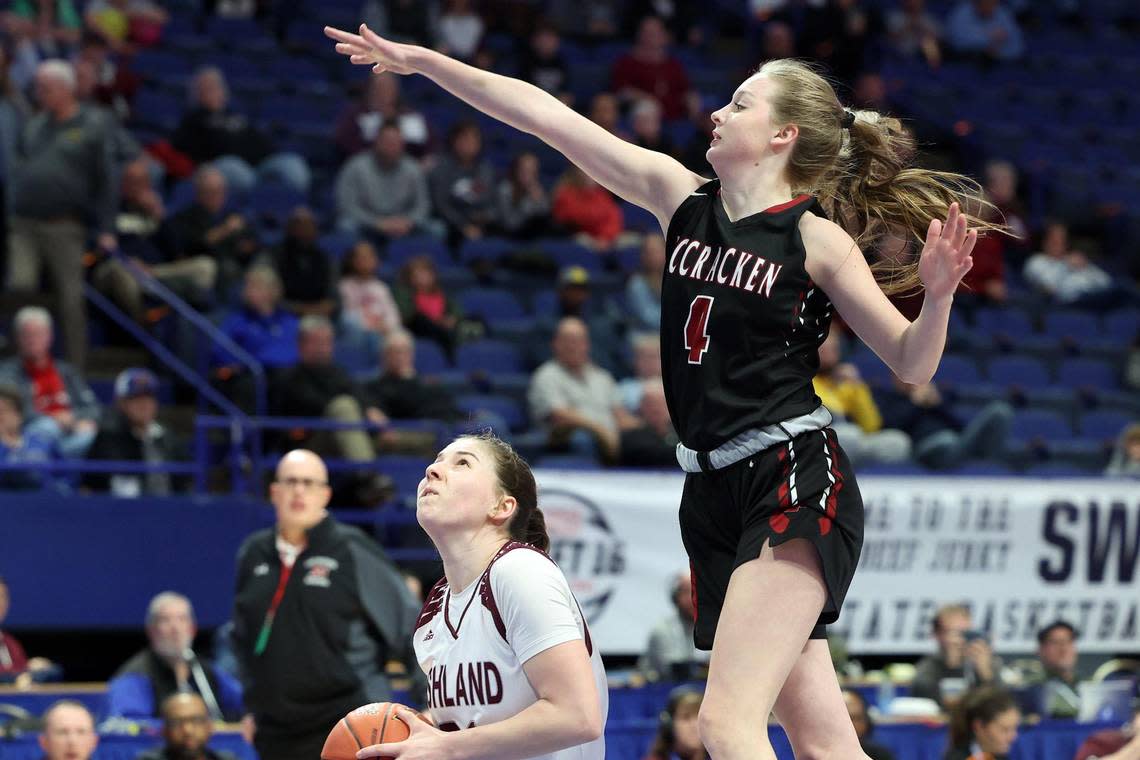Ashland Blazer’s Ella Sellars (21) tries to get off a shot while guarded by McCracken County’s Claire Johnson. Sellars led the Kittens with 20 points. Johnson had 13 points, five assists and four steals for the Mustangs.
