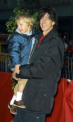 Ric Ocasek and child at the New York premiere of Warner Brothers' Harry Potter and The Sorcerer's Stone