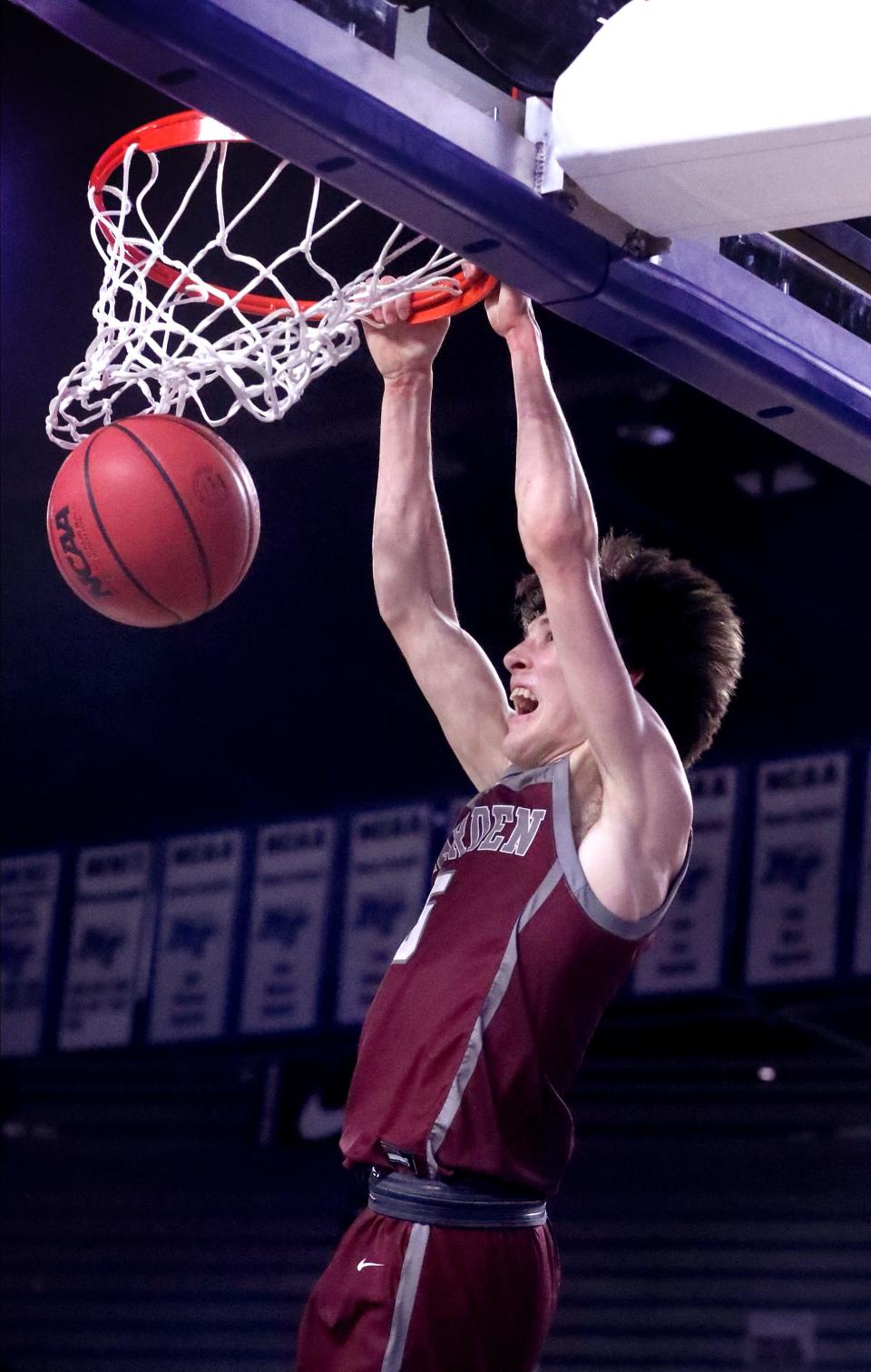 Bearden's Hayden Moseley (5) dunks the ball as they play against Dobyns-Bennett in the 2022 Class 4A TSSAA BlueCross Boys Basketball State Championship, on Saturday, March 19, 2022, at Murphy Center in Murfreesboro, Tenn.  