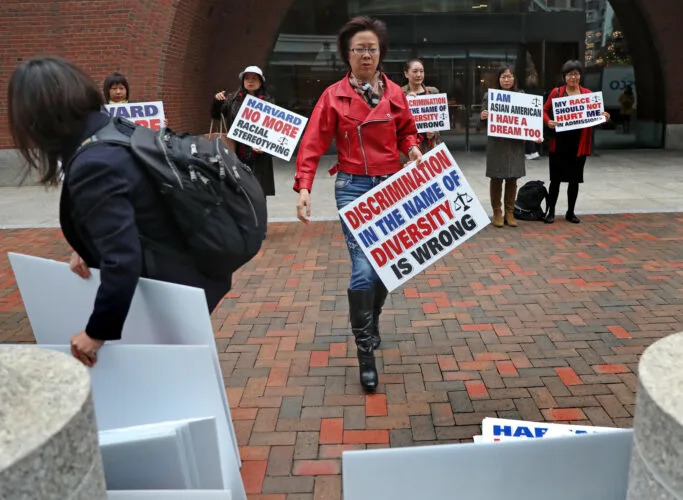 This year’s landmark <em>Students for Fair Admissions v. Harvard</em> case, brought on behalf of Asian students who argued they were victims of discrimination, dramatically rolled back the use of racial preferences in college admissions. (David L. Ryan/The Boston Globe/Getty Images)