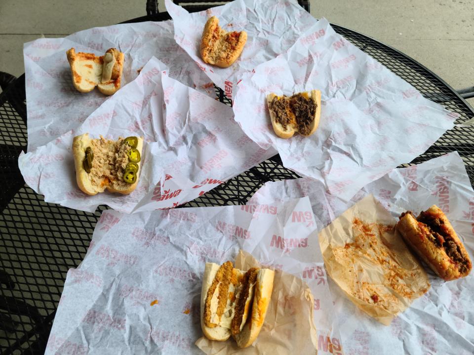 wawa sandwiches on table laid out