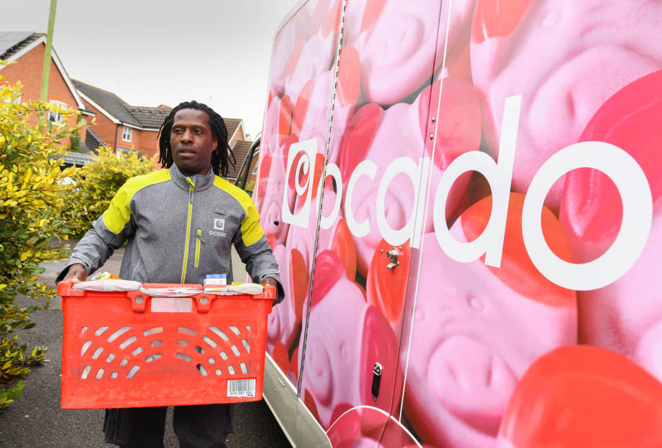 EDITORIAL USE ONLY A fleet of limited-edition Percy Pig delivery vans are unveiled as Ocado marks the arrival of the full M&S Food range to the online supermarket's website from today, September 1st.