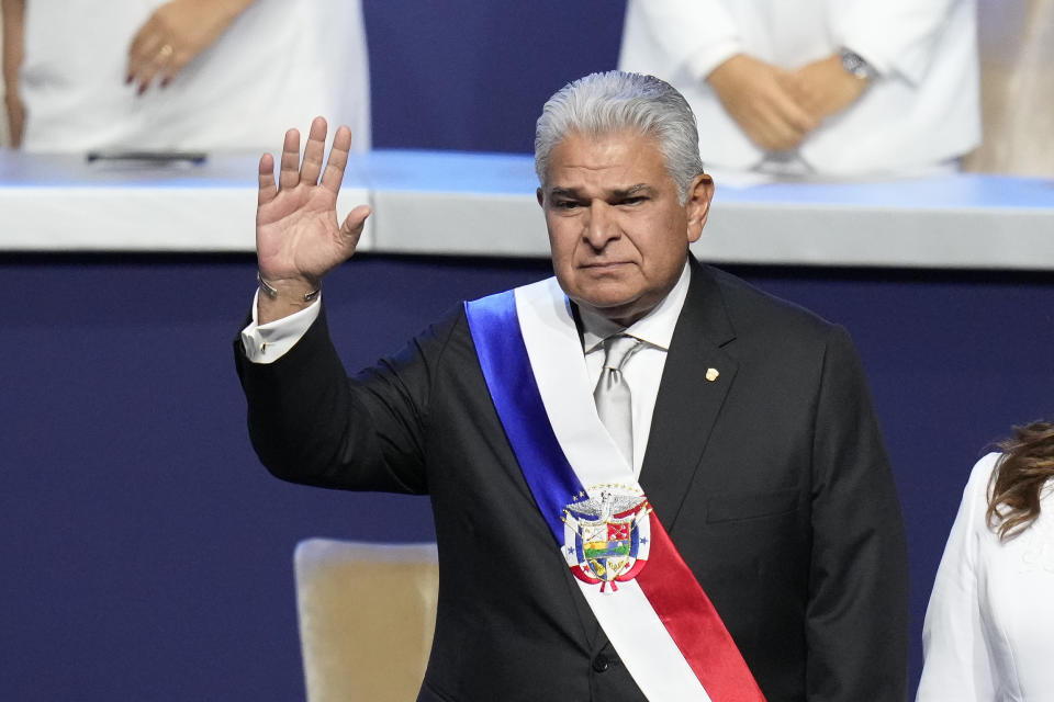 New Panamanian President Jose Raul Mulino waves before giving a speech at his swearing-in ceremony at the Atlapa Convention Centre in Panama City, Monday, July 1, 2024. (AP Photo/Matias Delacroix)