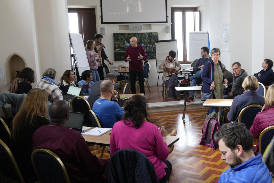 Stephan Posner, background center, the International Leader of L'Arche, an International charity that helps people with intellectual disabilities, starts a meeting with regional leaders of the community in Rocca Di Papa, near Rome, Wednesday, March 22, 2023. The findings of expert reports commissioned by L’Arche itself reveal that their founder, Jean Vanier, perverted Catholic doctrine to justify his own sexual compulsions and abuse women and that the movement he created had at its core a secret, a mystical-sexual “sect” founded for the precise purpose of hiding the sect’s deviant activities from church authorities(AP Photo/Gregorio Borgia)