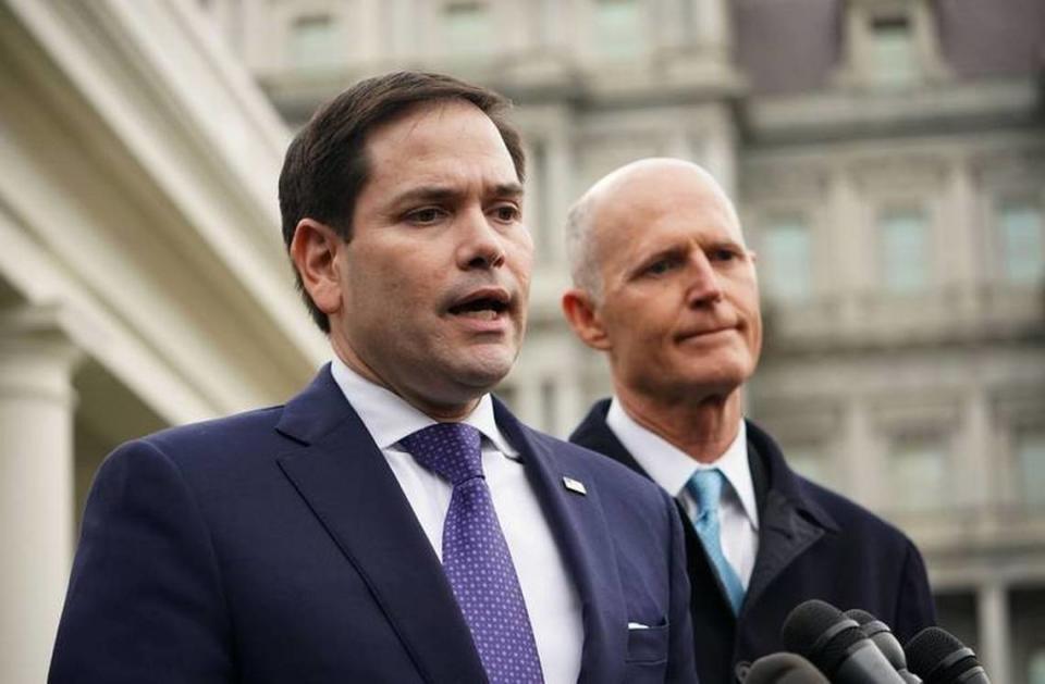 Florida U.S. Sens. Marco Rubio, left, and Rick Scott