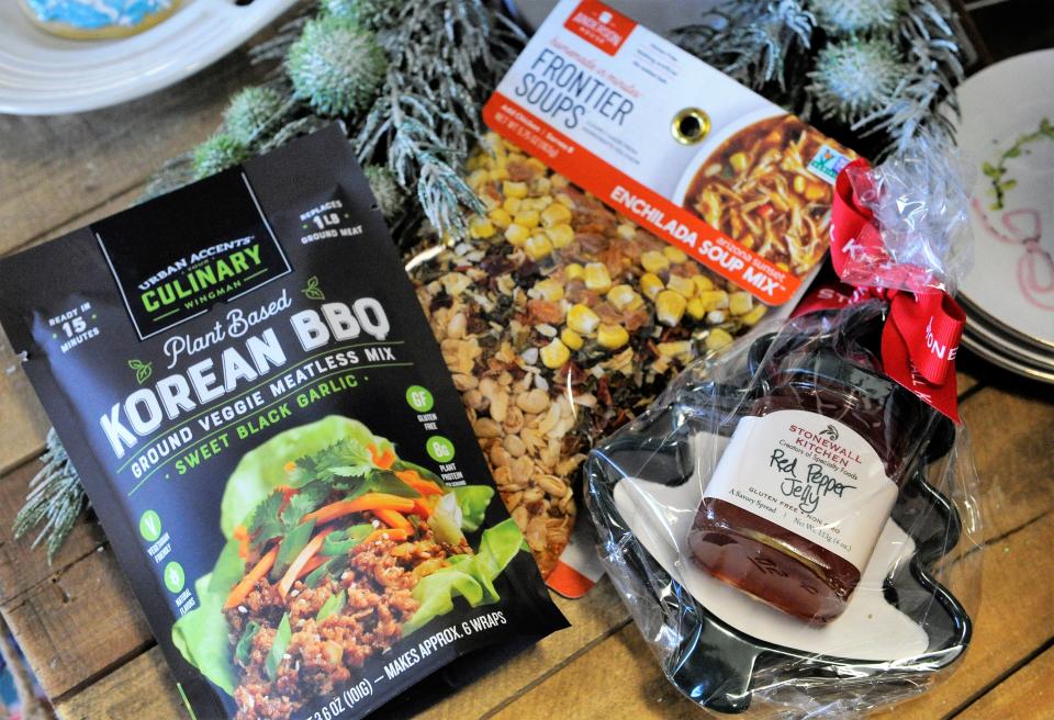 Food gifts from Thyme in the Kitchen: meatless Korean BBQ mix, Frontier enchilada soup mix, and Stonewall Kitchen red pepepr jelly with Christmas tree serving dish.