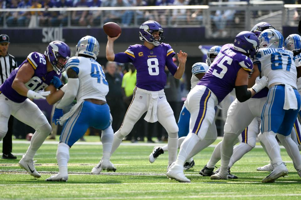 Vikings quarterback Kirk Cousins (8) throws a pass during the first half against the Lions, Sunday, Sept. 25, 2022, in Minneapolis.