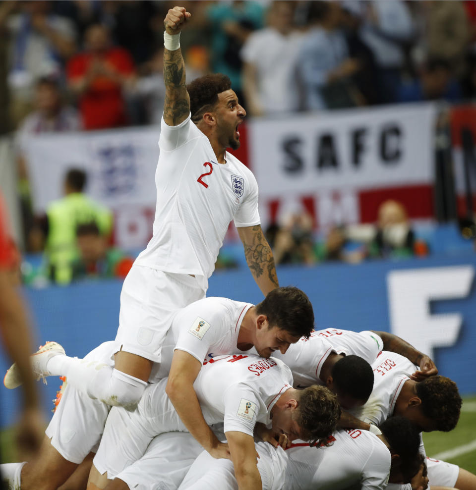 <p>Kyle Walker celebrates after ex-Spurs teammate Trippier put England ahead against Croatia </p>