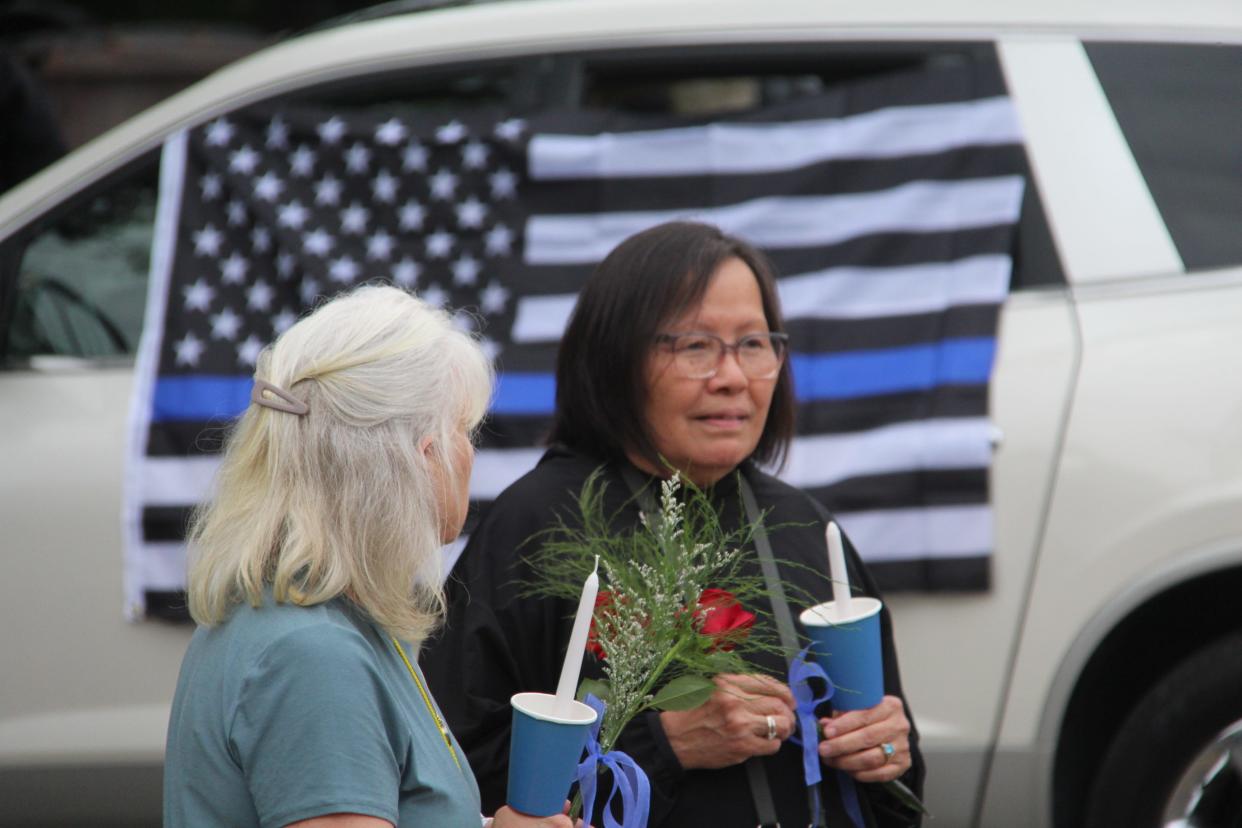 Prapai Ringman attended the vigil with around 150 members of the community July 4 at the Hillsdale County Sheriff's Office.