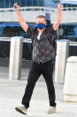 <p>Matt Damon triumphantly arrives at JFK Airport in N.Y.C. on July 22.</p>