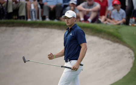 Golf - Australian Open Golf Tournament - Sydney, Australia - 20-11-2016 Jordan Spieth of the United States reacts to sinking a putt on the 16th hole on his way to winning the tournament. REUTERS/Jason Reed