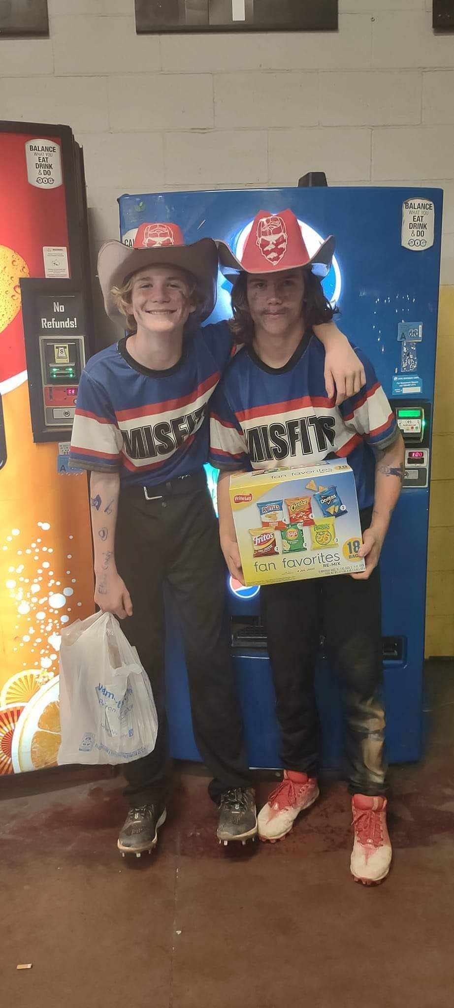 Ethan Candy (left), 14, and his friend, Cooper Armstrong (right), were teammates on their baseball team in Mustang.