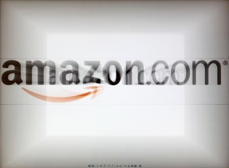 A zoomed image of a computer screen showing the Amazon logo is seen in Vienna November 26, 2012. To match Special Report TAX-AMAZON/ REUTERS/Heinz-Peter Bader