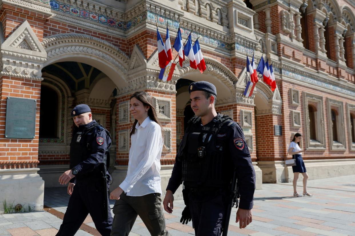 Police officers lead activist Vladislav Mazur away on Sunday during a one-person picket protesting against the arrest of Pavel Durov, founder and CEO of the Telegram messaging app, near the French embassy in Moscow, Russia.