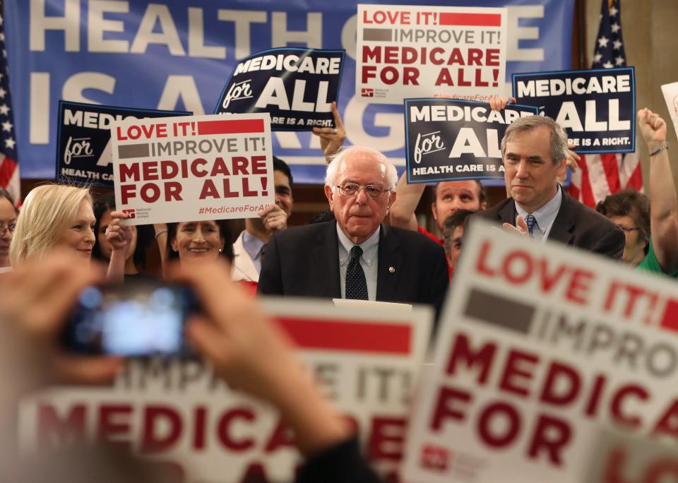 Sen. Bernie Sanders speaks while introducing health care legislation titled the "Medicare for All Act of 2019" with Sen. Kirsten Gillibrand and Sen. Jeff Merkley during a news conference on Capitol Hill, on April 9, 2019, in Washington.