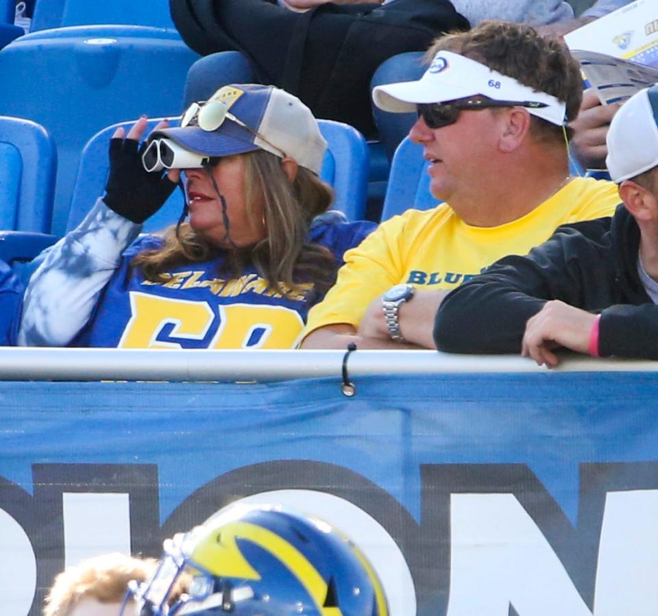 Traci and John Reed watch their son, Jake, and the Hens play against James Madison at Delaware Stadium Saturday, Oct. 23, 2021.