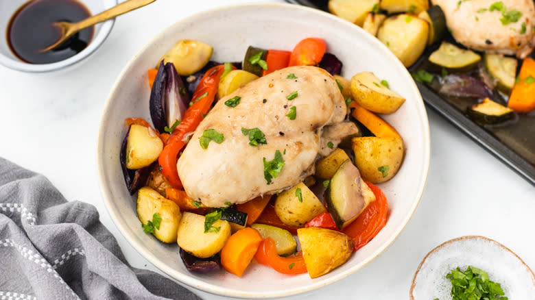 Baked chicken and veg in bowl