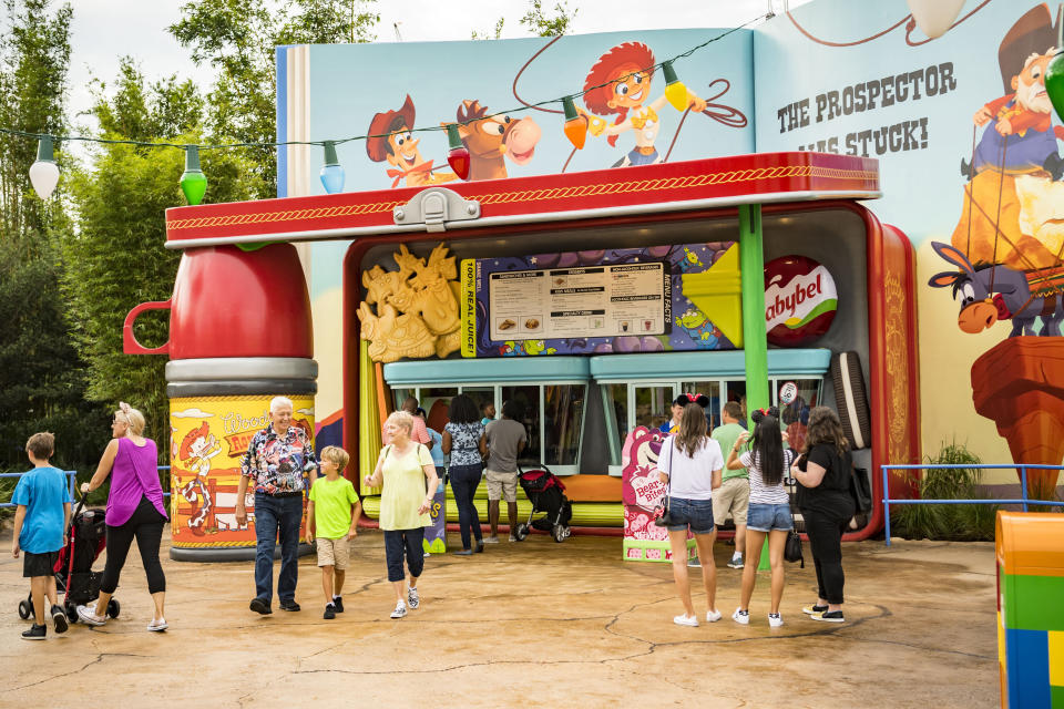 Woody's Lunch Box looks exactly like that: a lunch box. It offers food and beverages and features common objects (like the Babybel cheese packet) at the size a toy might view them.&nbsp;