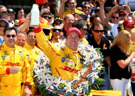 May 25, 2014; Indianapolis, IN, USA; IndyCar Series driver Ryan Hunter-Reay celebrates after winning the 2014 Indianapolis 500 at Indianapolis Motor Speedway. Mark J. Rebilas-USA TODAY Sports