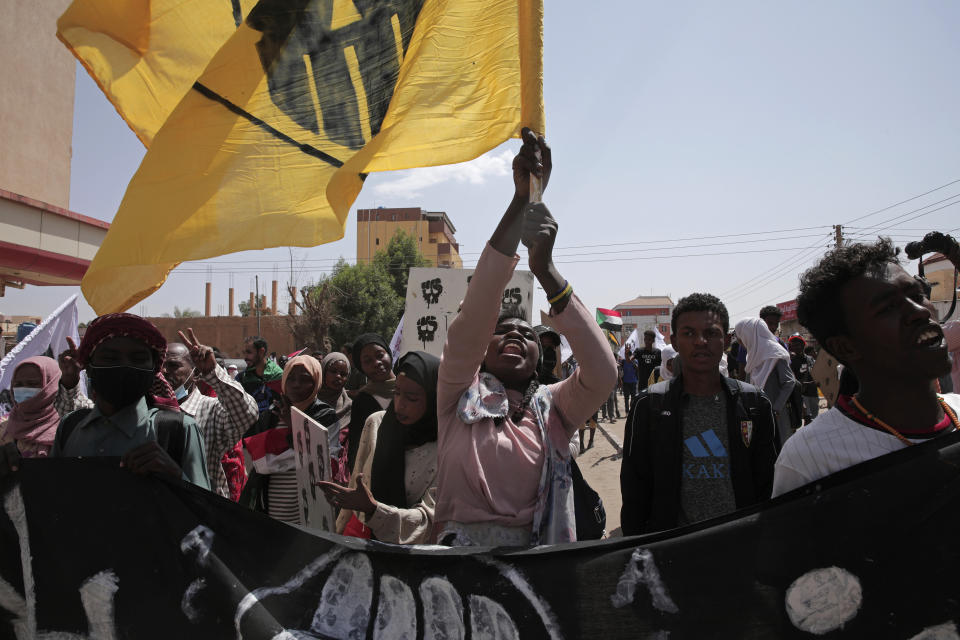 Sudanese protesters rally against the October 2021 military coup which has led to deaths and scores of arrests of demonstrators, in Khartoum, Sudan, Monday, Feb. 28, 2022. Since the coup, more than 80 people, mostly young men, have been killed and over 2,600 others injured in the protests, according to a Sudanese medical group. (AP Photo/Marwan Ali)