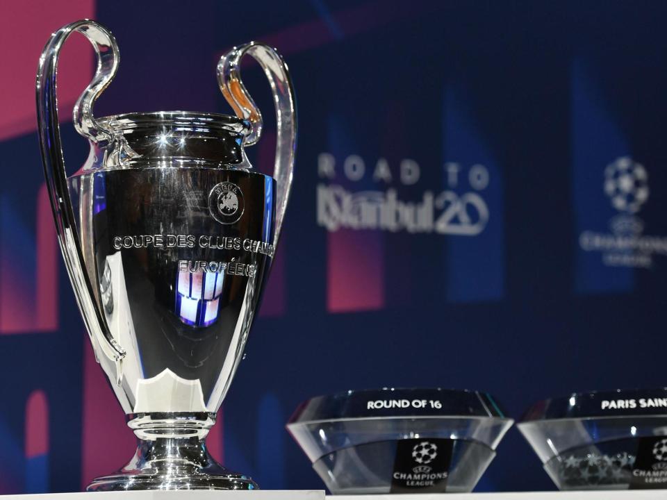 The UEFA Champions League football trophy: AFP via Getty Images