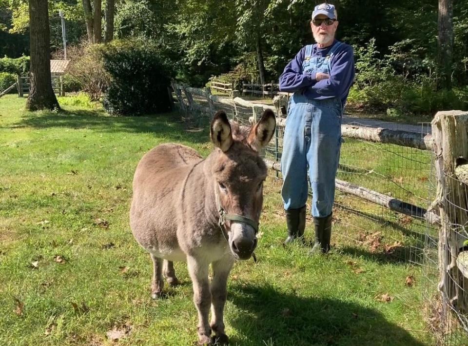 Robert Fleischbein, Exeter's viewer of fences, and his donkey George.