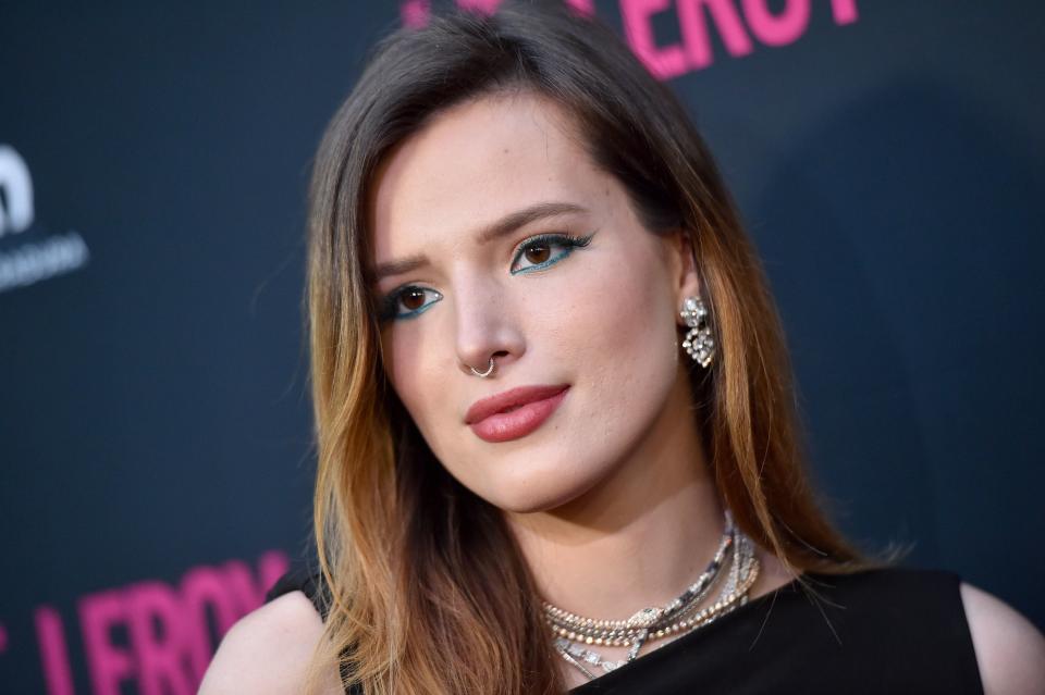 Bella Thorne poses at an event