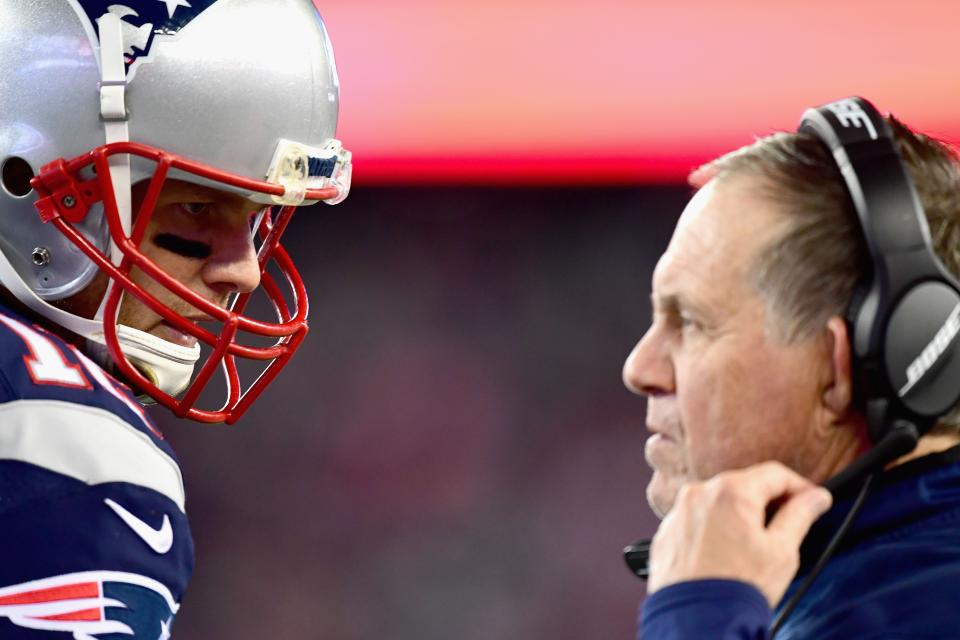 FOXBORO, MA - NOVEMBER 13:  Tom Brady #12 of the New England Patriots reacts with head coach Bill Belichick during the fourth quarter of a game against the Seattle Seahawks at Gillette Stadium on November 13, 2016 in Foxboro, Massachusetts.  (Photo by Billie Weiss/Getty Images)