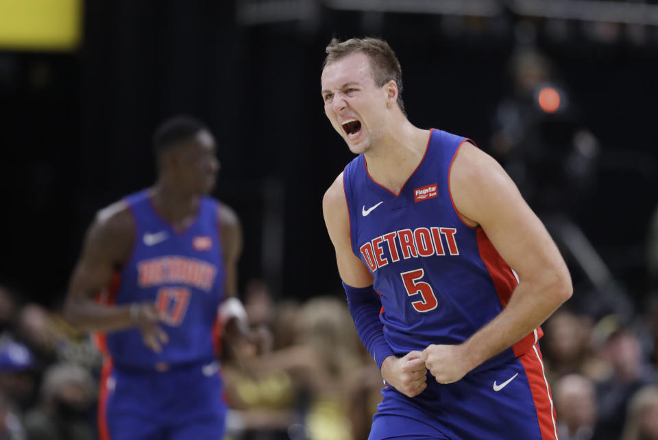 Detroit Pistons' Luke Kennard reacts after hitting a shot during the second half of the team's NBA basketball game against the Indiana Pacers, Wednesday, Oct. 23, 2019, in Indianapolis. Detroit won 119-110. (AP Photo/Darron Cummings)