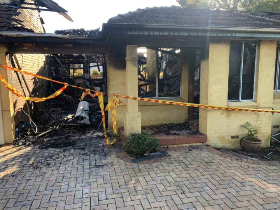 The burnt and destroyed home after the toy car ignited.