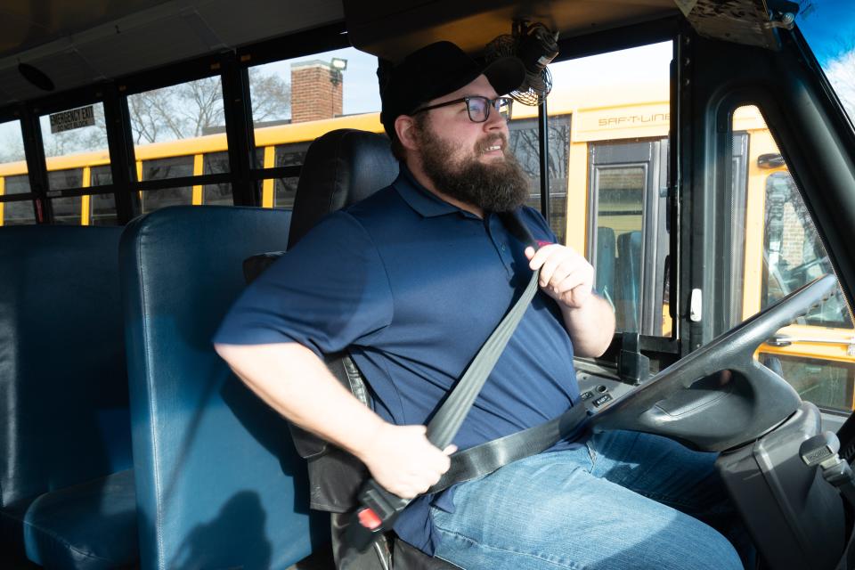 Besides doing the everyday custodian duties at Berryton Elementary, Austin Smith drives a school bus route in the afternoons for Shawnee Heights USD 450.