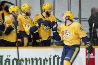 Nashville Predators center Ryan Johansen (92) celebrates after scoring the winning goal during a shootout in an NHL hockey game between the Predators and the Dallas Stars Sunday, April 11, 2021, in Nashville, Tenn. The Predators won 3-2. (AP Photo/Mark Humphrey)