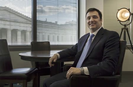 Gerry Gunster, a Washington-based strategist who has been hired by the Leave.EU campaign, poses for a portrait in his offices in Washington, October 7, 2015. Most Britons have never heard of Gunster, yet the 48-year-old American could play a major role in whether they vote to leave the European Union at a membership referendum due by the end of 2017. REUTERS/Jonathan Ernst