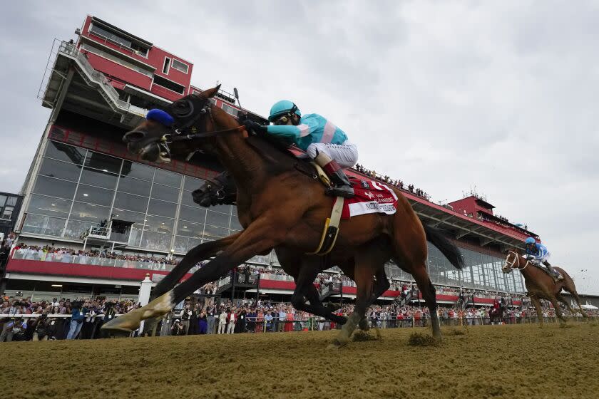 National Treasure, with jockey John Velazquez, edged out Blazing Sevens, with jockey Irad Ortiz Jr., to win the 148th race.