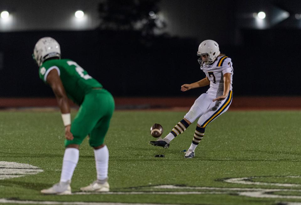 Castle’s Aleyna Quinn (7) returns the ball as the Castle Knights play the North Huskies at Bundrant Stadium in Evansville, Ind., Friday evening, Aug. 19, 2022. 