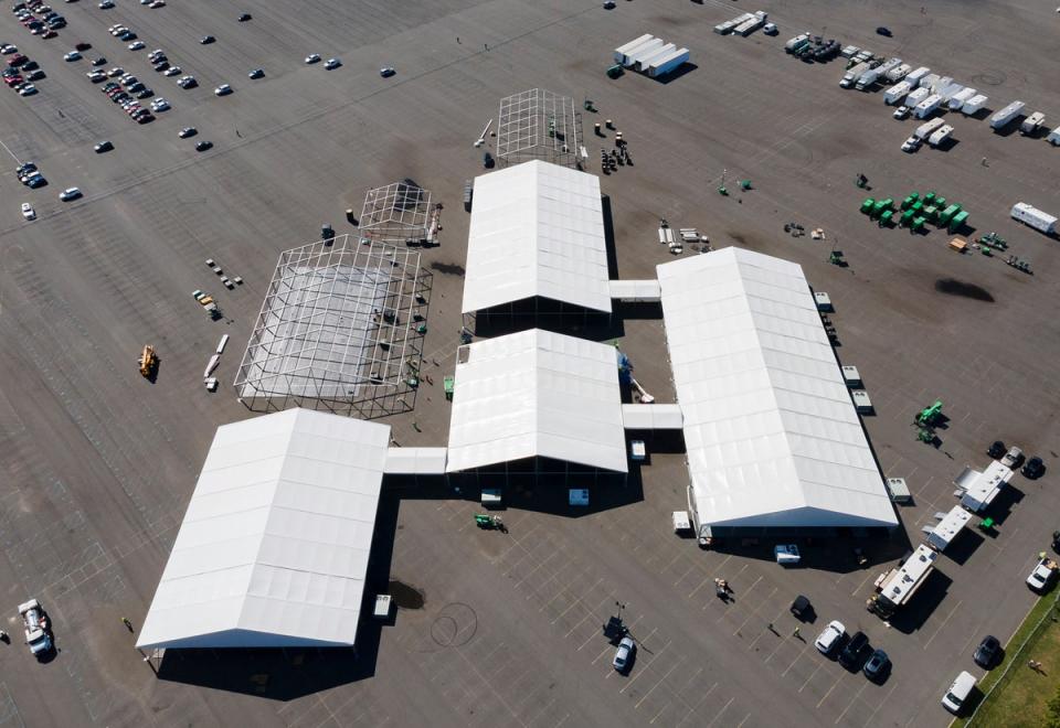 An aerial photo shows New York City’s initial emergency tent facilities in The Bronx before it was disassembled days later due to flood risk. The city is now using a lot on Randall’s Island for its shelter plan (EPA)