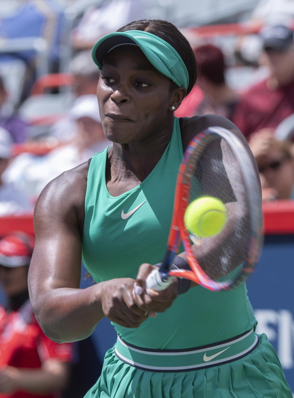 Sloane Stephens of the United States returns to Anastasija Sevastova of Latvia during quarterfinals play at the Rogers Cup tennis tournament Friday, Aug. 10, 2018 in Montreal. (Paul Chiasson/The Canadian Press via AP)